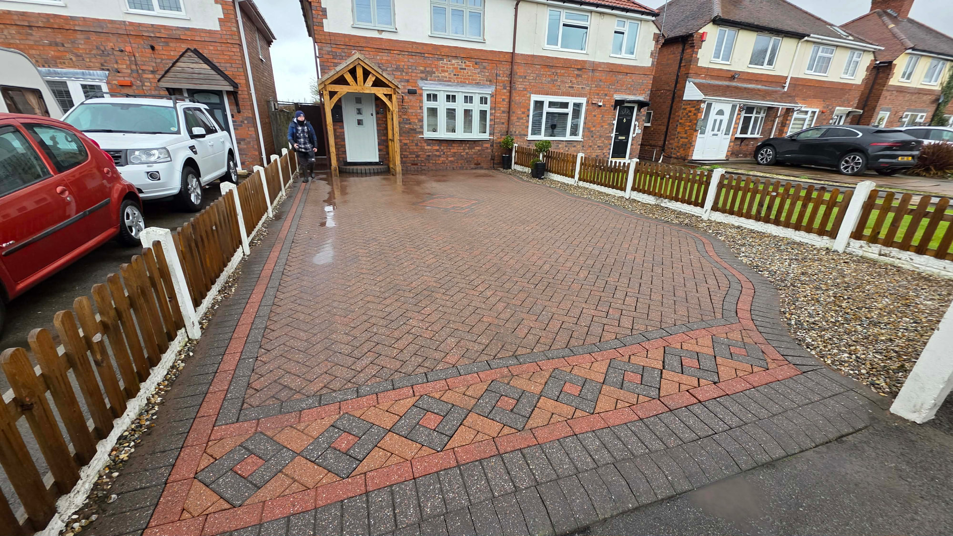Freshly cleaned patterned block paving driveway