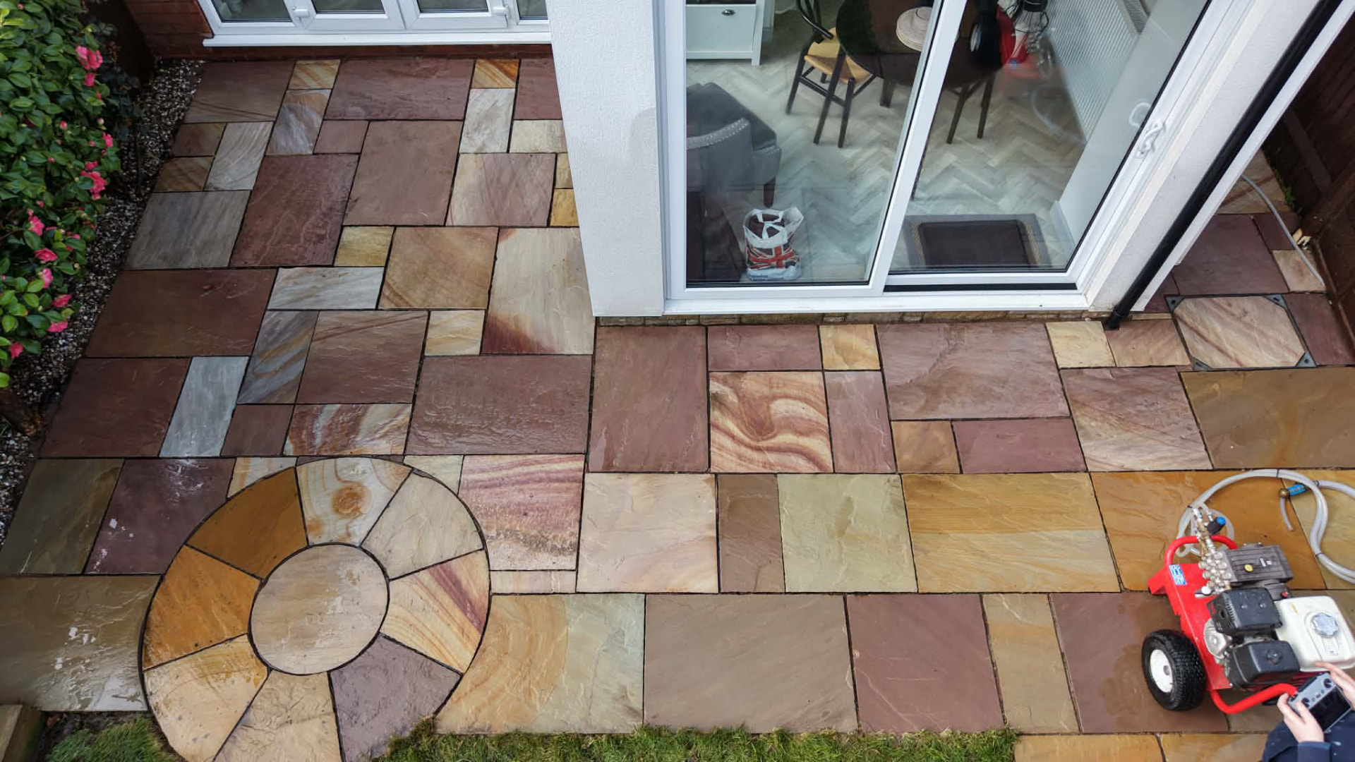 Sandstone patio cleaned back to original colour