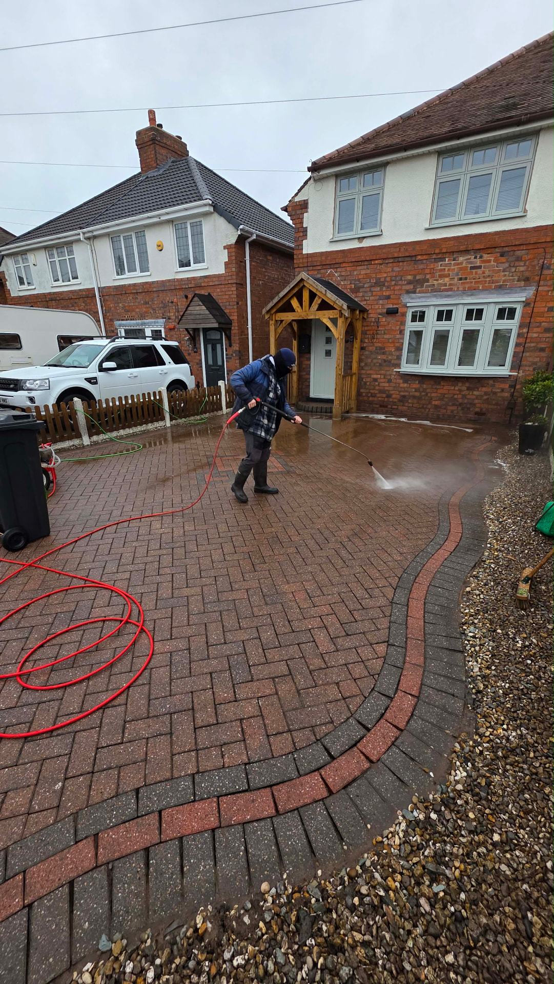 Pressure washing a block paved driveway