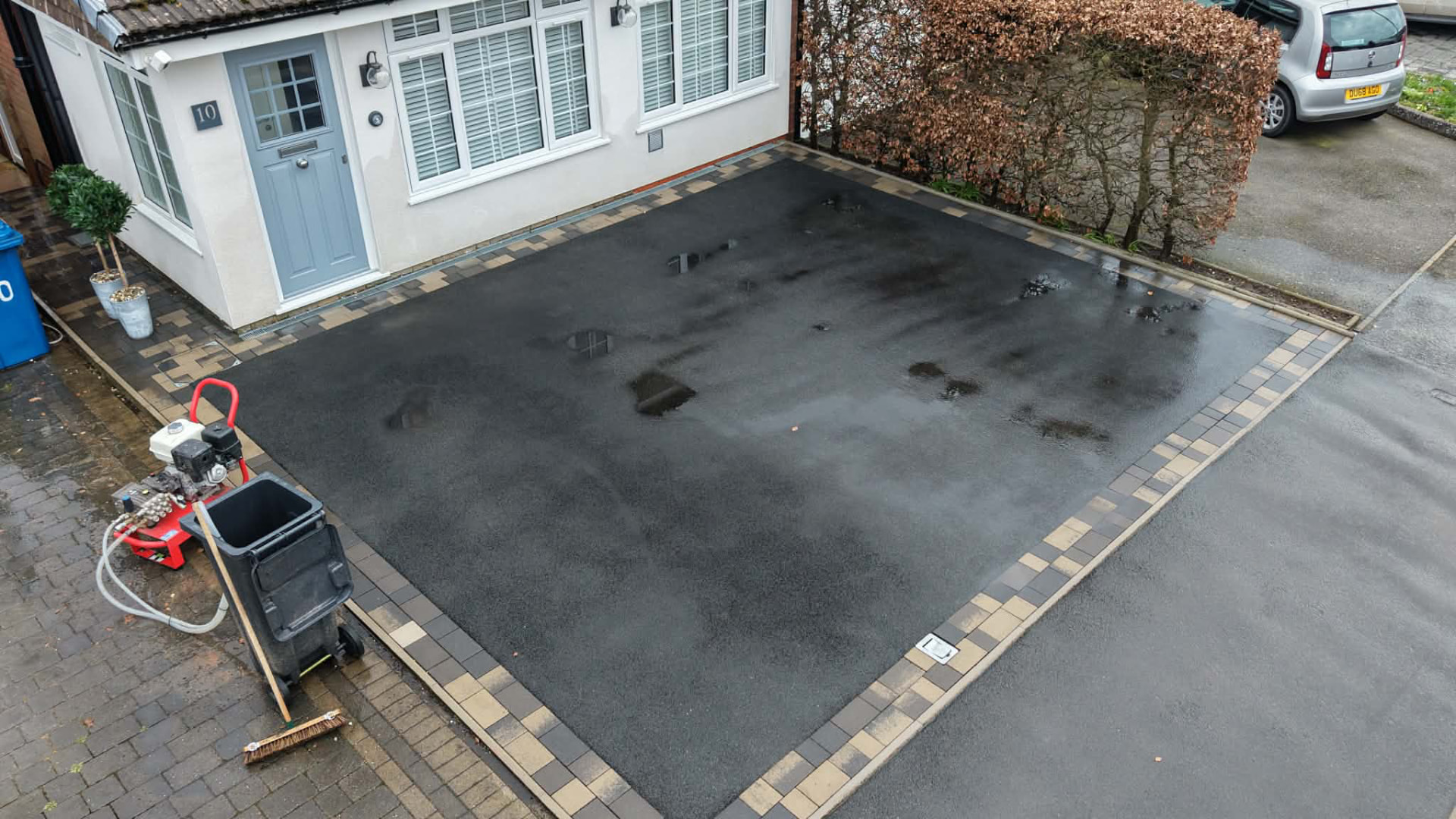 Tarmac driveway cleaned with paved border